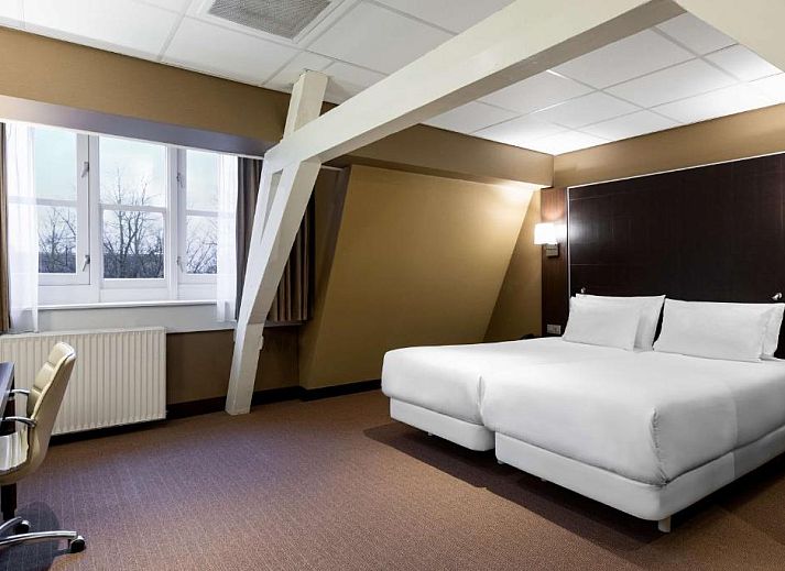 Stijlvolle werkruimte in NH Centre Utrecht Hotel, ideaal voor zakelijke reizigers in Utrecht.