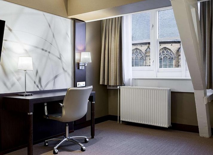 Stijlvolle werkruimte in NH Centre Utrecht Hotel, ideaal voor zakelijke reizigers in Utrecht.