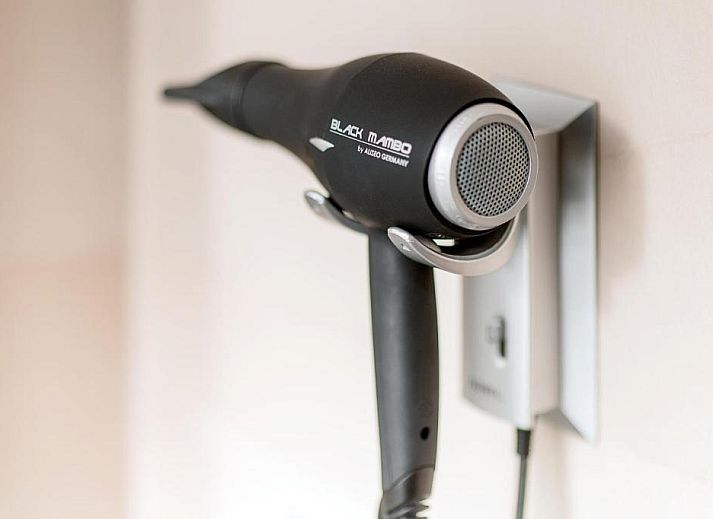 Gezellige lobby van NH Centre Utrecht Hotel met comfortabele zitplaatsen in Utrecht.