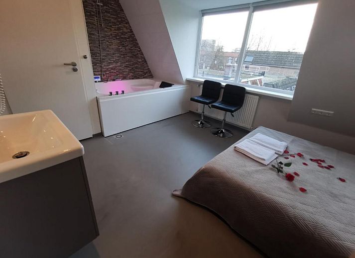 Comfortabele slaapkamer in Hotel-Chao NL, Utrecht, ideaal voor ontspanning.