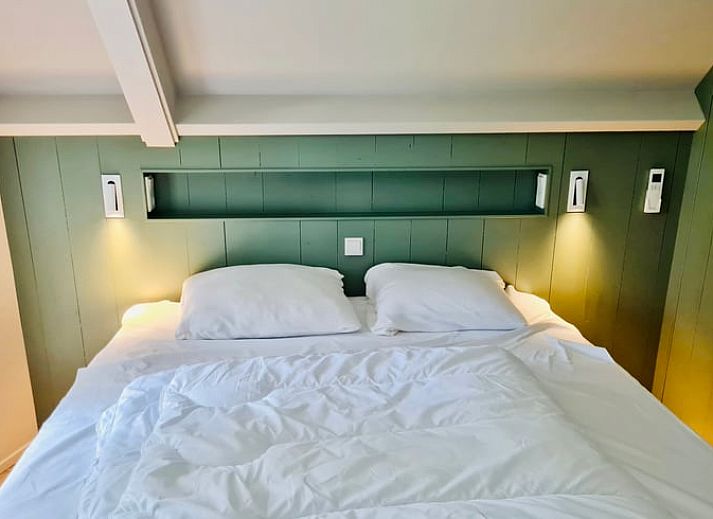 Ferienhaus in Ballum auf Ameland mit Reetdach und grossem Garten, ideal fuer einen entspannten Aufenthalt auf den Watteninseln.