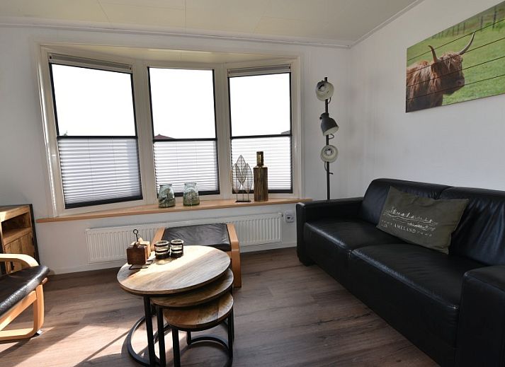 Cozy bedroom in Oester 167 vacation home, Ballum, Ameland with double bed and built-in closets.