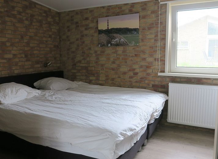 Gemuetliches Wohnzimmer im Bungalow Helma, Ballum, Ameland mit moderner Einrichtung.