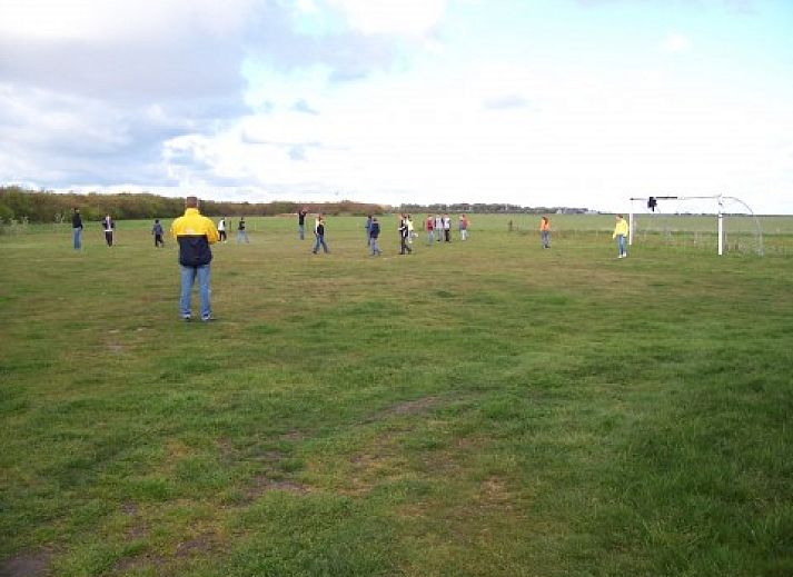 De Hollumer trap vakantiehuis in Ballum, Ameland met landelijke omgeving en groene tuin.
