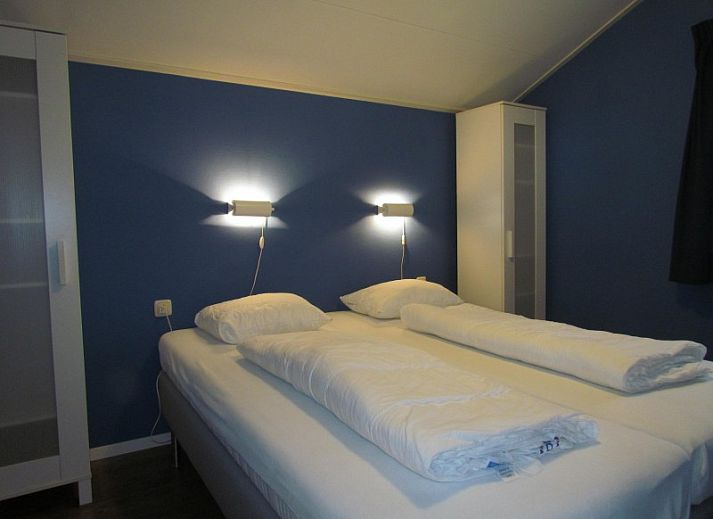 Calimero-Ferienhaus in Ballum, Ameland mit schoener Terrasse und gruener Umgebung auf den Watteninseln.