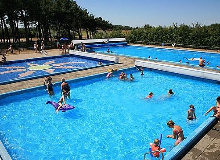 Modern kitchen in bungalow Marjan, Ballum, Ameland with dining area on the Wadden Islands.