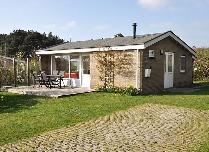Modern kitchen in bungalow Marjan, Ballum, Ameland with dining area on the Wadden Islands.