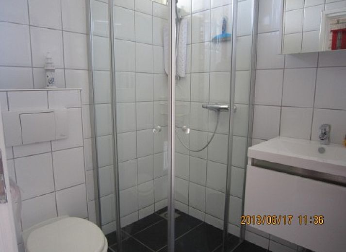 Gezellige woonkamer in De Klipper, vakantiehuis op Ameland, Waddeneilanden.