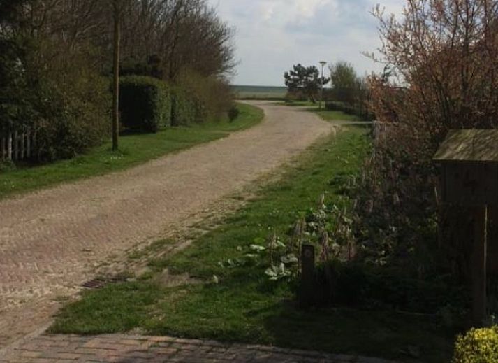 Gezellige eetruimte in Vakantiehuisje in Buren Ameland, perfect voor familiediners op de Waddeneilanden.