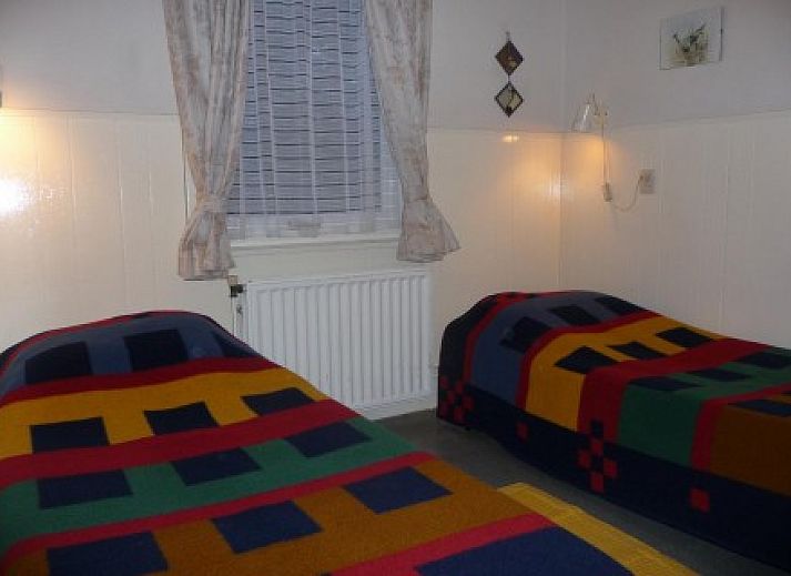 Gemtliches Wohnzimmer im Bungalow Dolphin, Buren, Ameland, mit viel Licht.