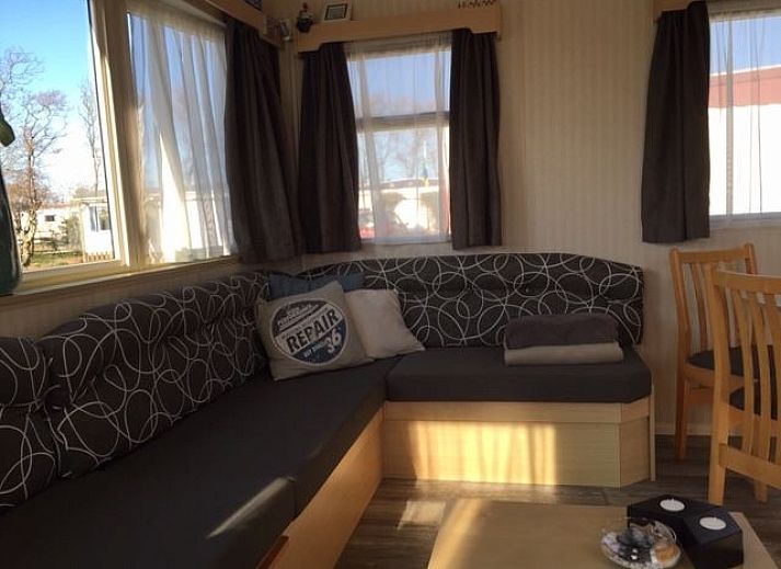 Mobile home De Hout in Buren, Ameland, surrounded by nature and tranquility.