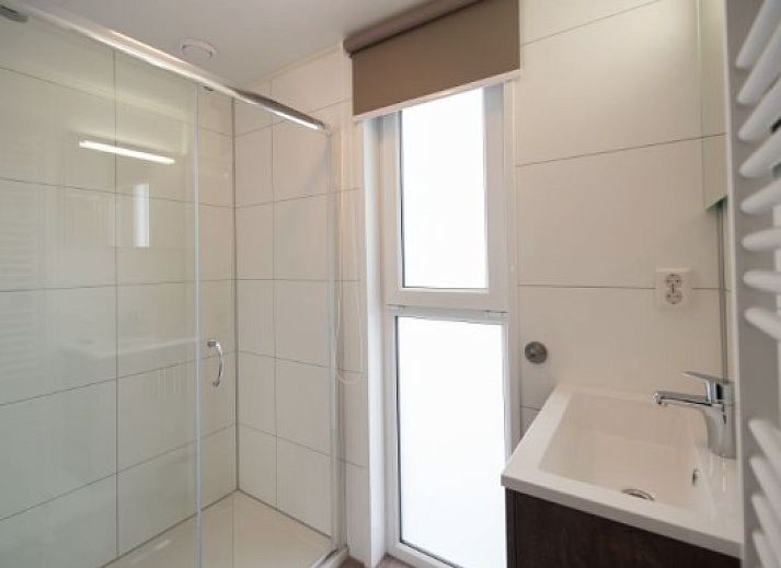 Gemuetliche Sitzecke in VUURTORENLODGE 6, Ferienhaus in Hollum, Ameland mit stilvoller Einrichtung und Dekoration.