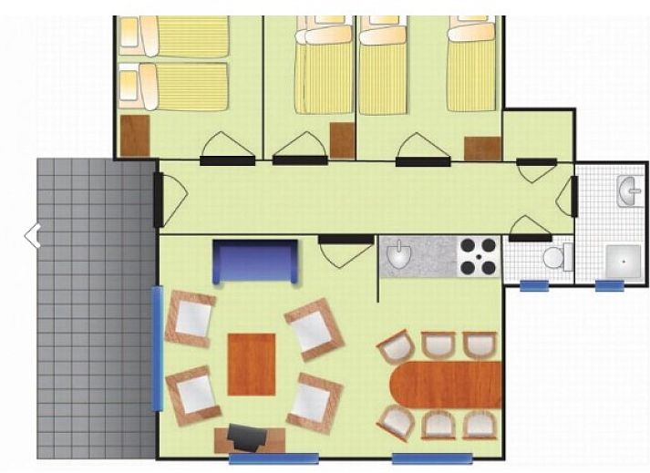 Exterior view of FINSE BUNGALOW 6 in Hollum, Ameland, with terrace and green surroundings on the Wadden Islands.