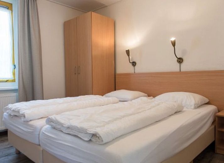 Quiet terrace at DUINBUNGALOW 4 in Hollum, Ameland, ideal vacation home on the Wadden Islands.