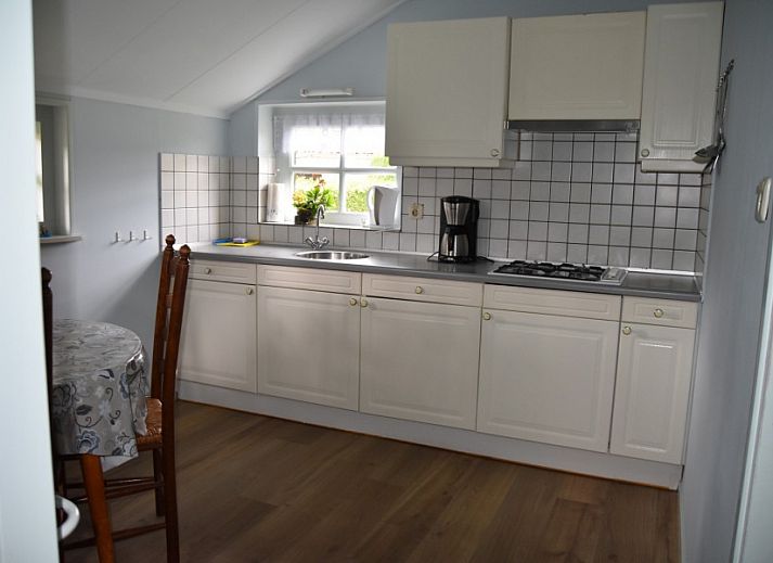 On the sunny side of Holiday home Kiewiet Ameland in Hollum, you will enjoy a green garden and rustic charm on the Wadden Islands.