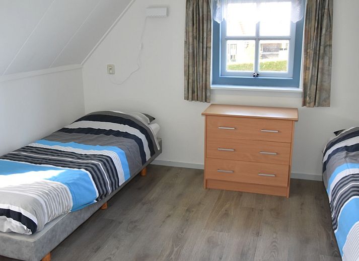 On the sunny side of Holiday home Kiewiet Ameland in Hollum, you will enjoy a green garden and rustic charm on the Wadden Islands.