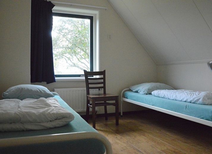 Gemuetliche Sitzecke in Het Woonhuis, Ferienhaus in Hollum, Ameland, mit modernen Moebeln und viel Tageslicht.