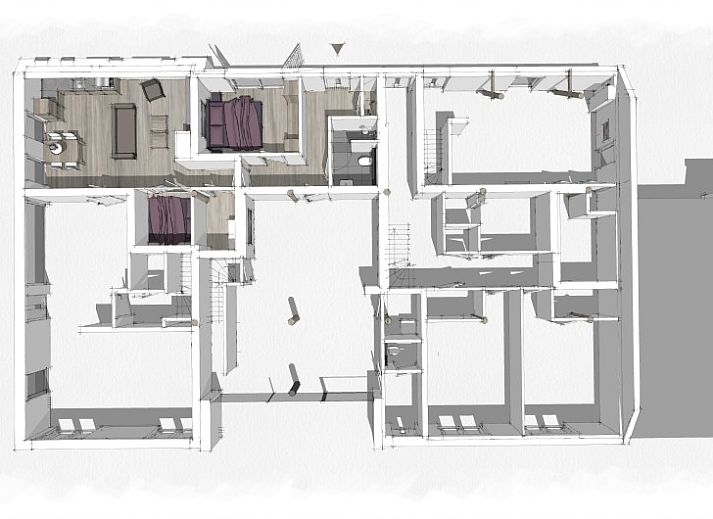 Open keuken en zithoek in De Deel, appartement in Hollum, Ameland, met sfeervolle haard en moderne voorzieningen.