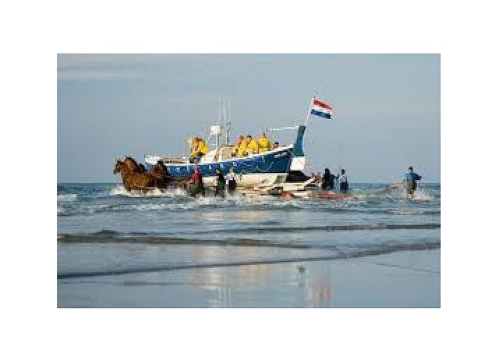 Gezellige zithoek op het terras van Duyngolf 71 vakantiehuis in Hollum Ameland.