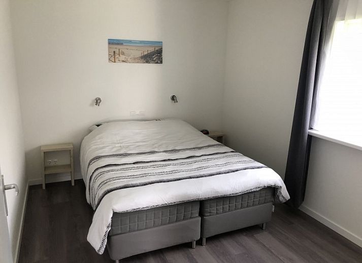 Gemuetliches Ferienhaus 'n Best Plak in Hollum, Ameland mit Terrasse und gruener Umgebung auf den Watteninseln.