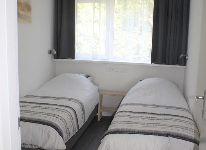 Gemuetliches Ferienhaus 'n Best Plak in Hollum, Ameland mit Terrasse und gruener Umgebung auf den Watteninseln.