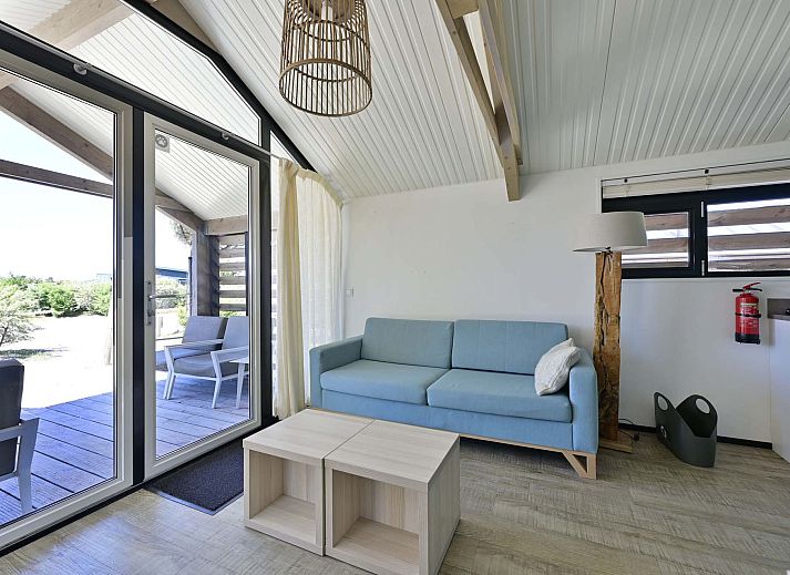 Gemtliche Veranda in einem freistehenden Haus in Hollum, Ameland, ideal zum Entspannen in der Natur der Watteninseln.