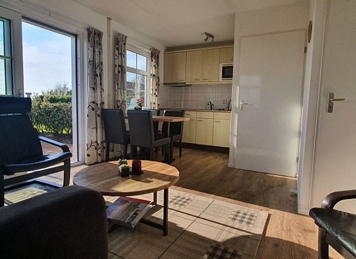 Ilsebil vacation home in Hollum, Ameland with spacious garden and view of historic church.