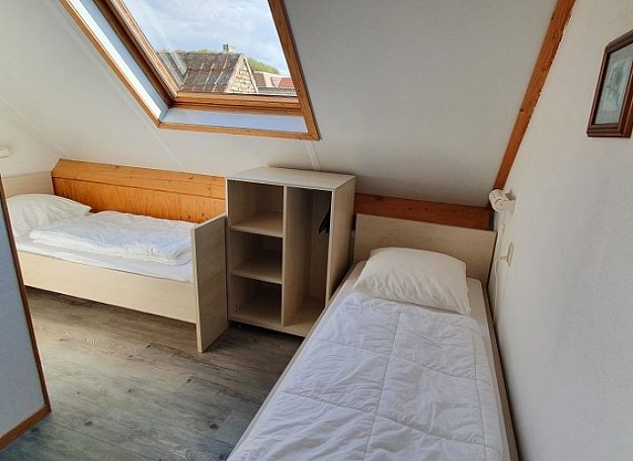 Ferienhaus Piggelmee in Hollum, Ameland mit grossem Garten und Blick auf die Kirche.