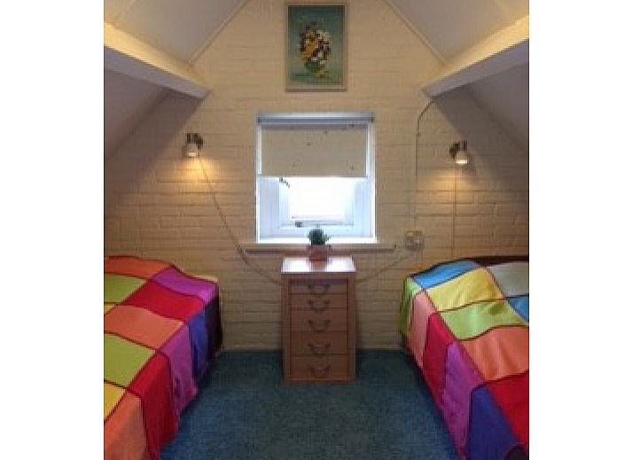 Charmantes Ferienhaus WELTEVREE in Hollum, Ameland mit bluehendem Garten auf den Watteninseln.