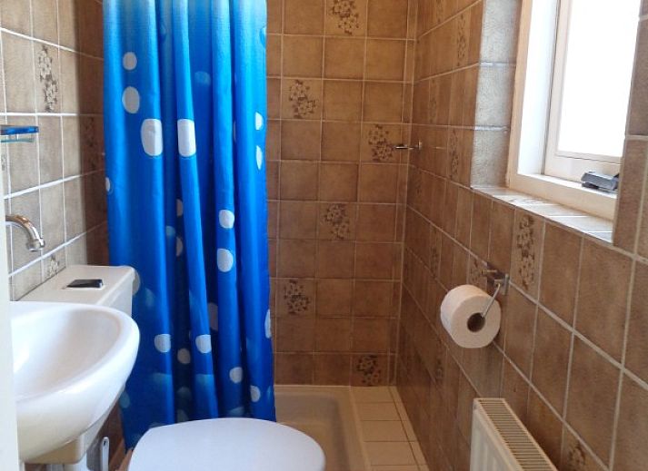 Charmantes Ferienhaus WELTEVREE in Hollum, Ameland mit bluehendem Garten auf den Watteninseln.