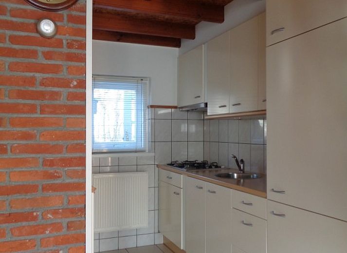 Charmantes Ferienhaus WELTEVREE in Hollum, Ameland mit bluehendem Garten auf den Watteninseln.