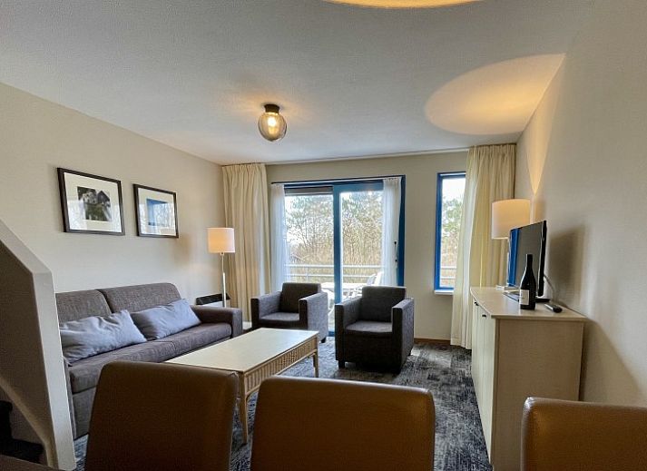 Gezellige slaapkamer met twee eenpersoonsbedden in vakantiehuis Duindoorn, Hollum, Ameland.