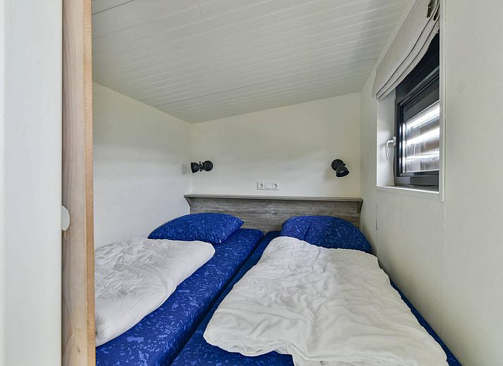 Overdekte buitenruimte bij Vrijstaande woning in Hollum, Ameland, ideaal voor ontspanning.