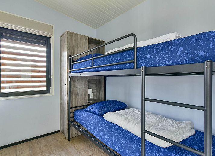 Overdekte buitenruimte bij Vrijstaande woning in Hollum, Ameland, ideaal voor ontspanning.