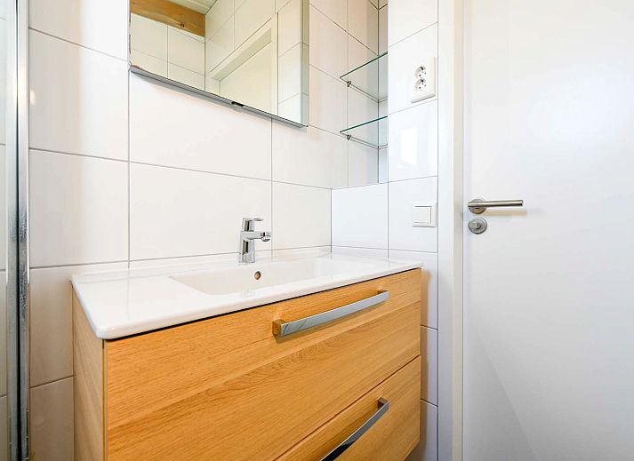 Gemtliche Sitzecke auf der Terrasse des freistehenden Hauses in Hollum, Ameland, ideales Feriendomizil auf den Watteninseln.