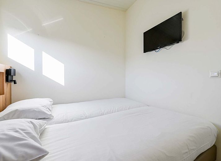 Gemtliche Sitzecke auf der Terrasse des freistehenden Hauses in Hollum, Ameland, ideales Feriendomizil auf den Watteninseln.