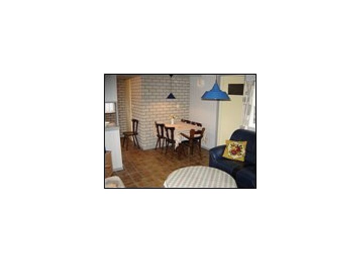 Charmantes Ferienhaus Pirolie in Hollum, Ameland, mit grnem Garten und rustikaler Atmosphre.