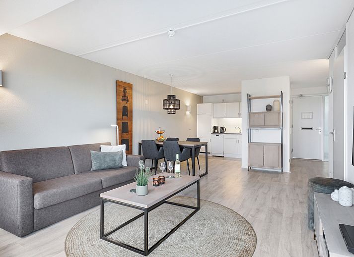 Stylish living room in Ameland State 2-bed apartment in Nes, Ameland with comfortable furniture and beautiful views.