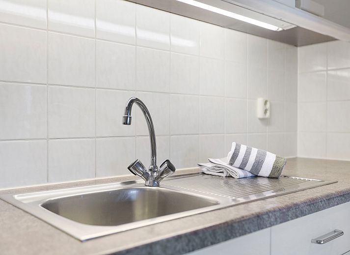 Exterior of Ameland State 2-bed apartment in Nes, Ameland with modern architecture and balcony.