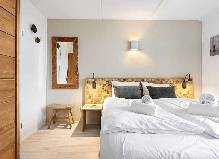 Exterior of Ameland State 2-bed apartment in Nes, Ameland with modern architecture and balcony.