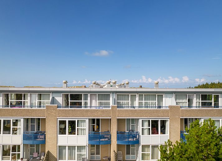 Open kitchen and living room in Ameland State 2-bed apartment in Nes, Ameland, ideal for cozy get-togethers.