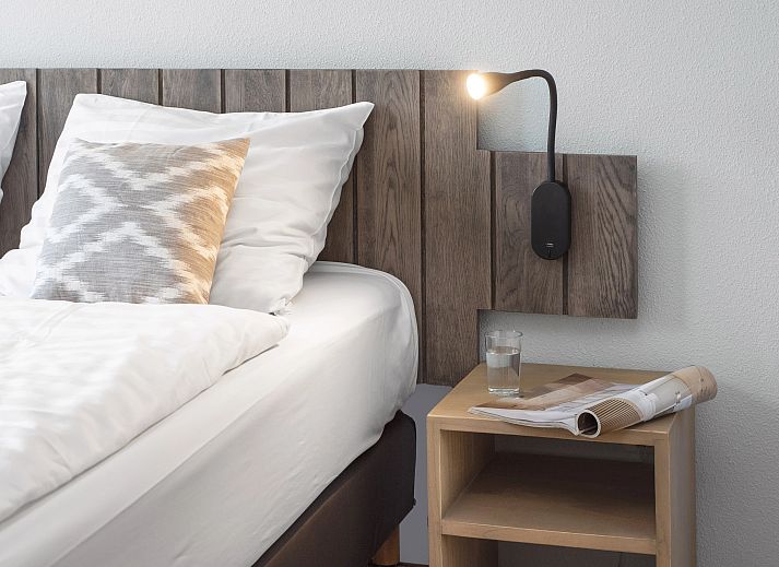 Stylish dining and living room in Ameland State apartment, ideal for 2-4 people in Nes, Ameland.