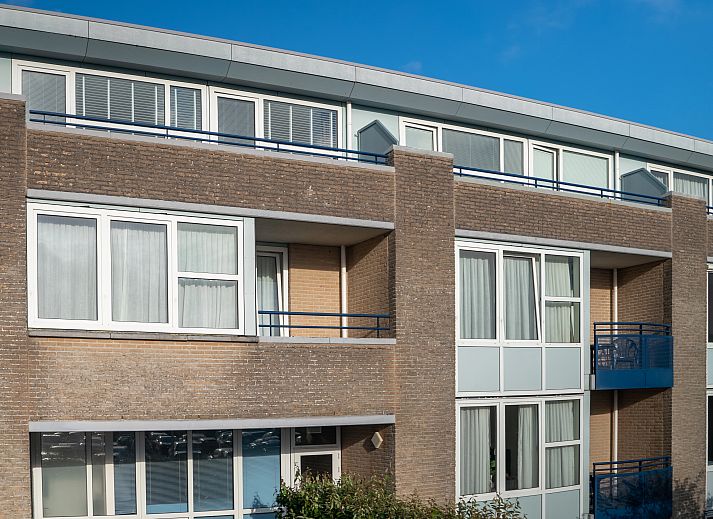 Stylish dining and living room in Ameland State apartment, ideal for 2-4 people in Nes, Ameland.