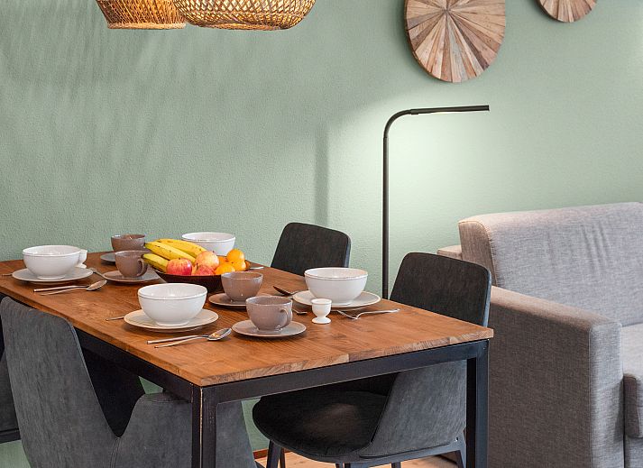 Exterior of Ameland State 4-person apartment in Nes, Ameland with balcony and terrace.