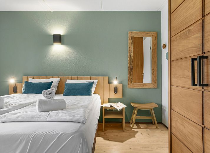 Exterior of Ameland State 4-person apartment in Nes, Ameland with balcony and terrace.