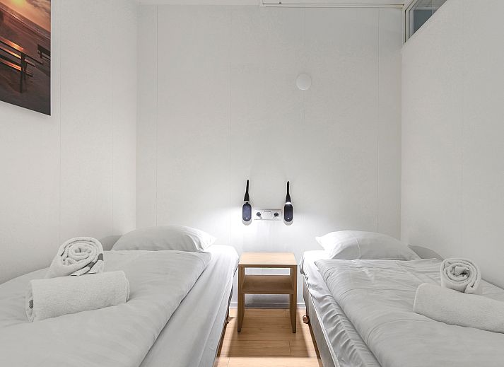 Modern kitchen and dining area in Ameland State 4-person apartment in Nes, Ameland.