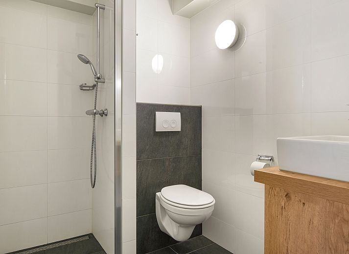 Comfortable sitting area in Ameland State 4-person apartment in Nes, Ameland.