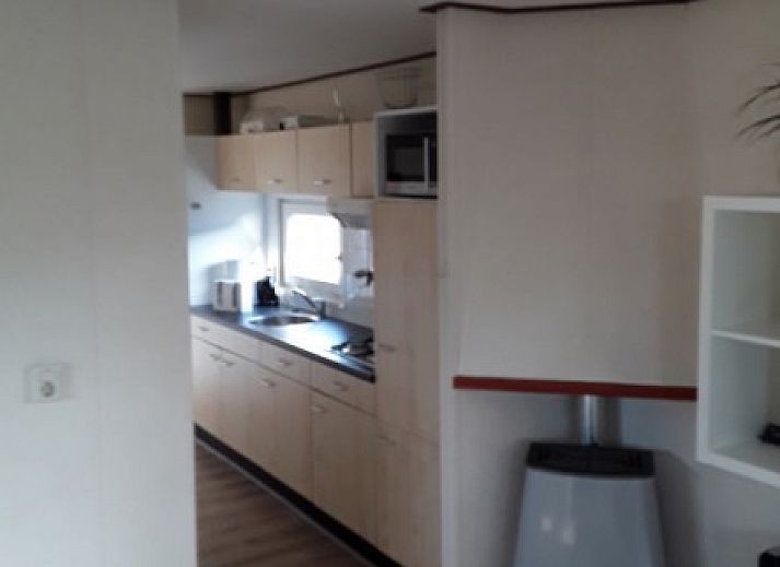 Strand bij chalet Protter in Buren, Ameland, perfect voor ontspanning en genieten van de Waddeneilanden.