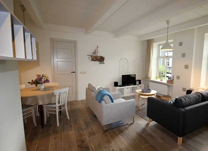 Charming vacation home Westhoek in Schiermonnikoog with cozy terrace in the Wadden Islands.