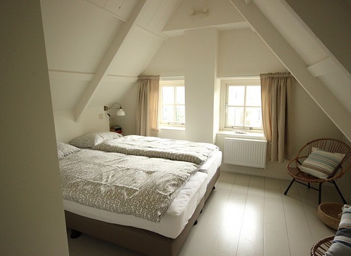 Charming vacation home Westhoek in Schiermonnikoog with cozy terrace in the Wadden Islands.